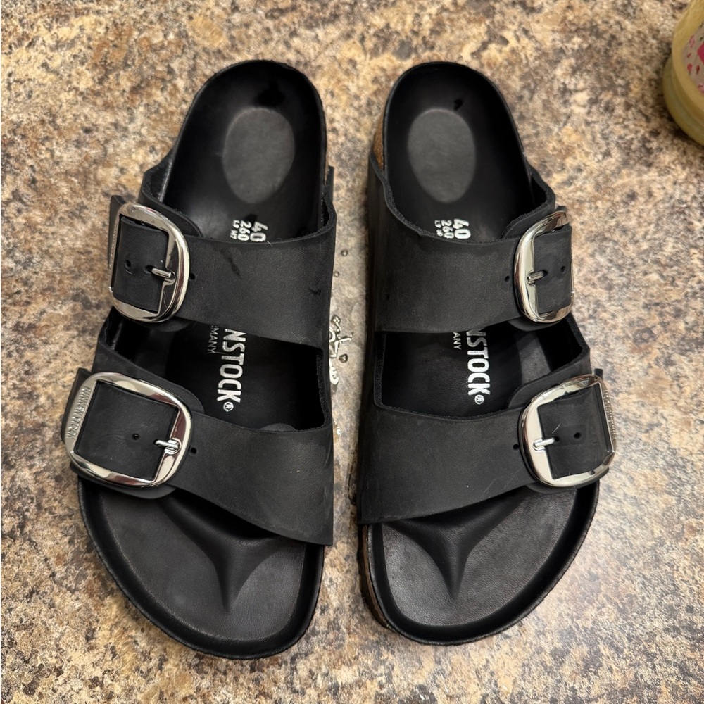 Big buckle Birkenstocks.  Brand new.  Never worn.  No box.  Too big for me.